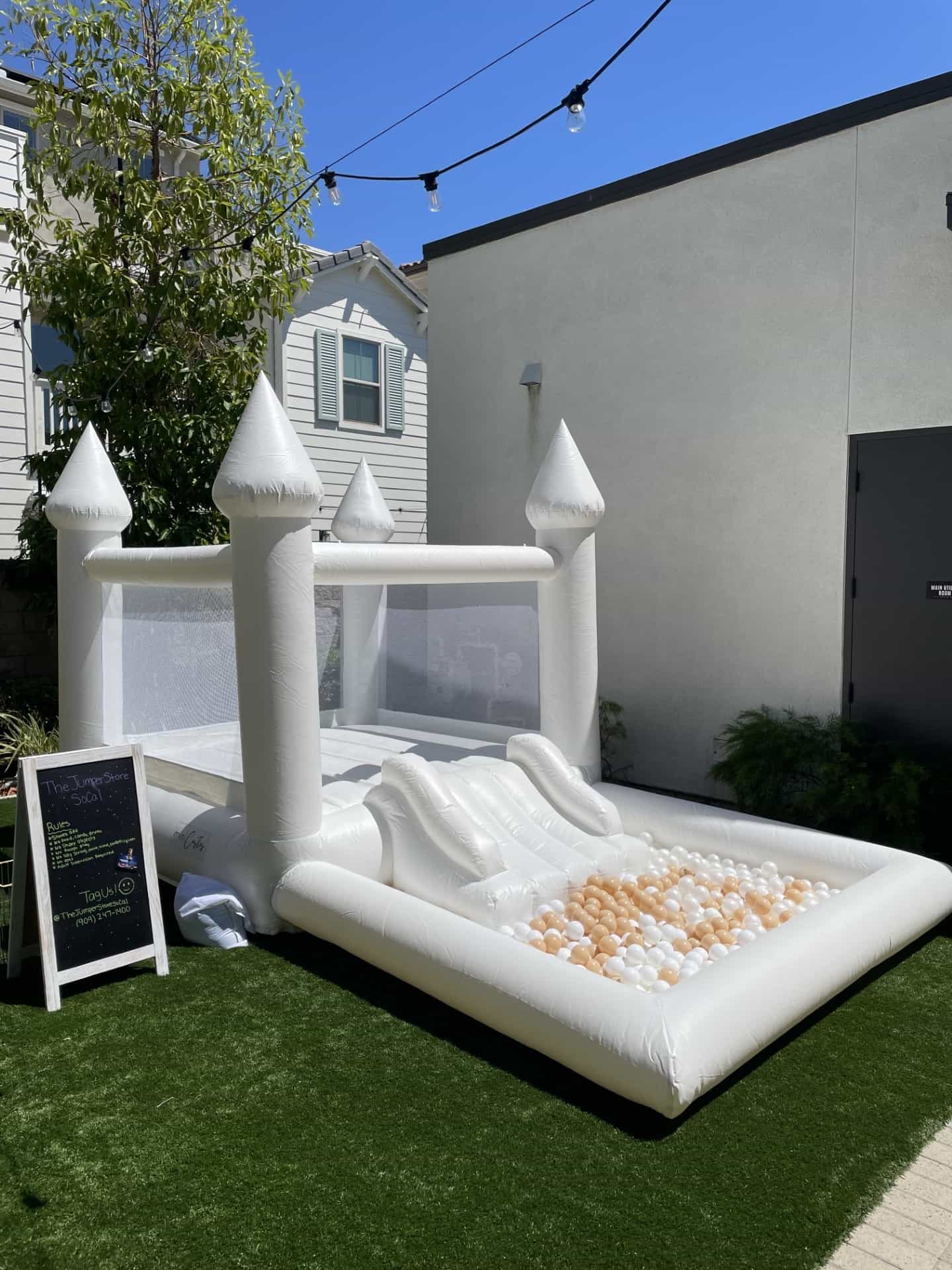 White bounce house rental at an outdoor event in Chicago