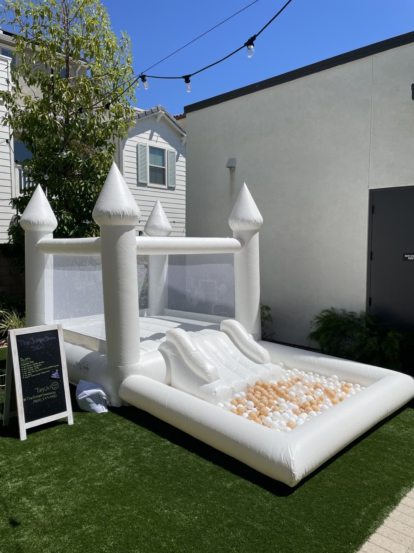 White bounce house — outdoor setup